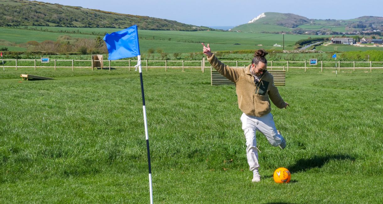 Person playing Football Golf at Tapnell Farm, Isle of Wight